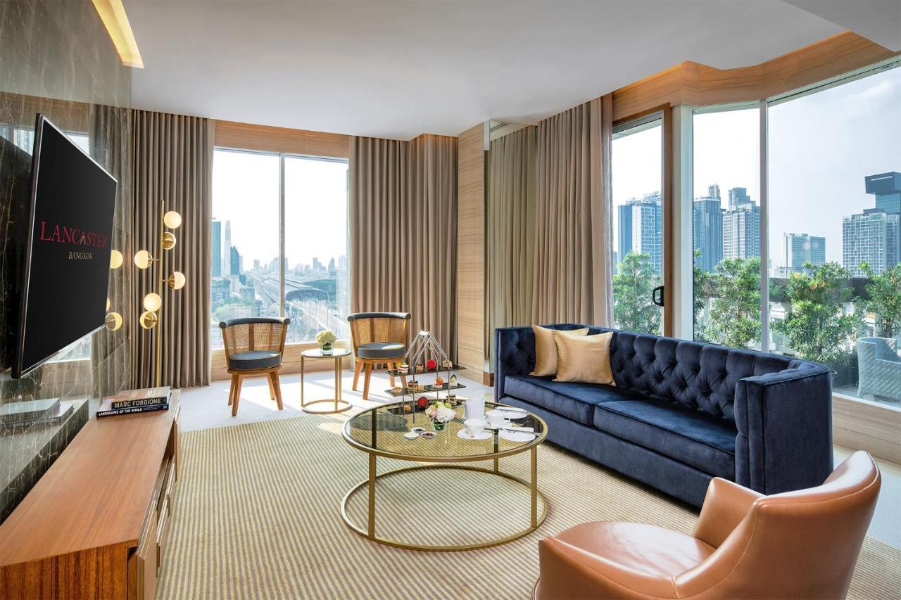 Lancaster Bangkok Hotel Exterior photo Living room of a suite at the hotel